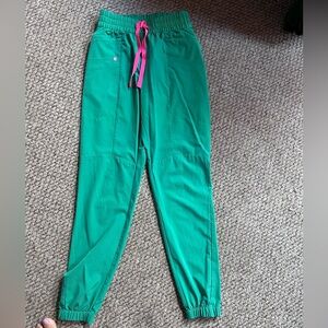FIGS safety green joggers.